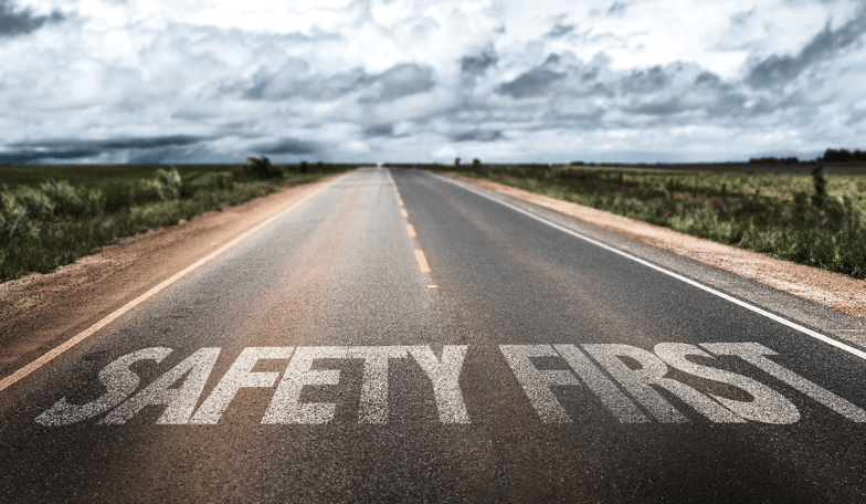 Road with "SAFETY FIRST" written on it